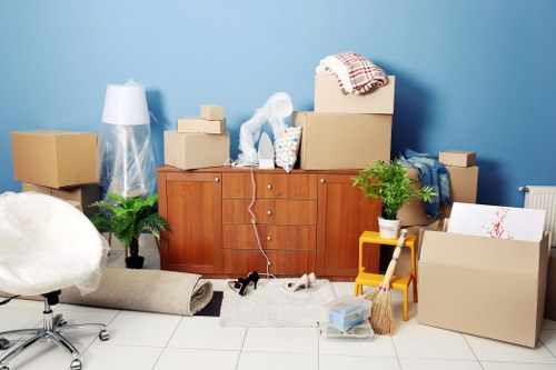 Furniture collection team handling bulky household items in Abbeywood
