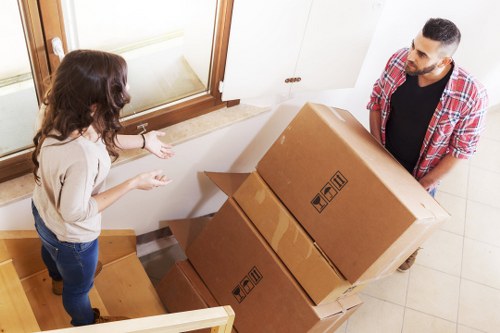 Packed moving boxes and furniture for a home move