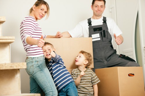 Moving team handling furniture in an Abbeywood property